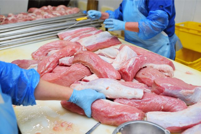 butchers-prepare-appetizing-cuts-of-fresh-pork-mea-2022-09-07-05-32-30-utc-scaled