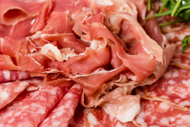 closeup-of-prosciutto-and-salami-italian-platter-2021-08-26-15-36-01-utc-scaled